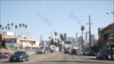 开车市中心街道这些洛杉矶加州美国散焦视图车玻璃挡风玻璃车道模糊路车辆好莱坞相机内部汽车城市审美